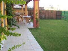 Property Photo: Garden with gate onto pool area