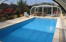 Property Photo: 8 x 4m pool with walk-in Abris (cover)