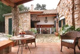 Property Photo: Shaded terrace and BBQ area