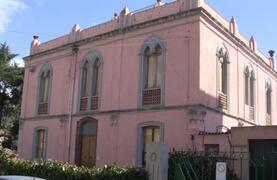 Property Photo: front of the pink palace