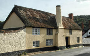 Property Photo: Chimney cottage is on the left
