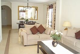 Property Photo: Spacious lounge leading to the terrace