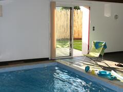 Property Photo: Indoor swimming pool with hydro massage jets.