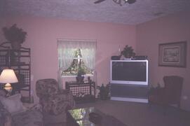 Property Photo: Big screen TV VCR DVD and Satelittle and 300 movies in collection to chooose from