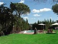 Property Photo: Lawn with view to Pool Area