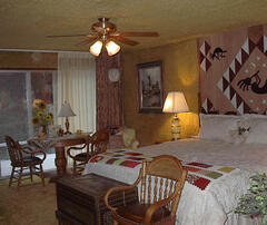 Property Photo: Aztec Room - King Size Bed - Large Windows - Private Bath and entrance