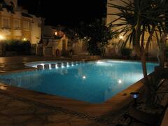 Property Photo: The pool at night