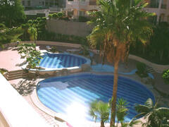 Property Photo: View of pools from balcony